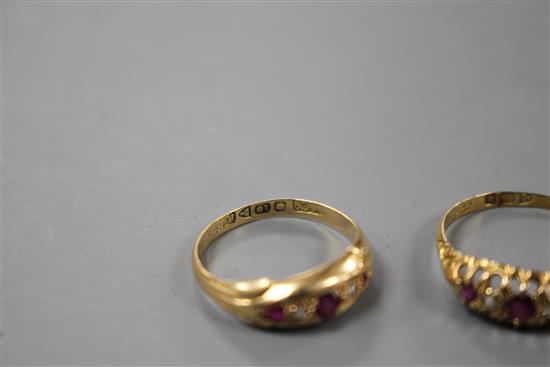 Two early 20th century 18ct gold, ruby and diamond set dress rings,